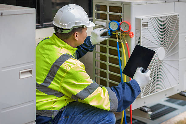 Professional Air Conditioning Repair technician working in Colona, IL
